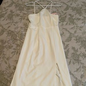 Super cute white body snug dress with slit